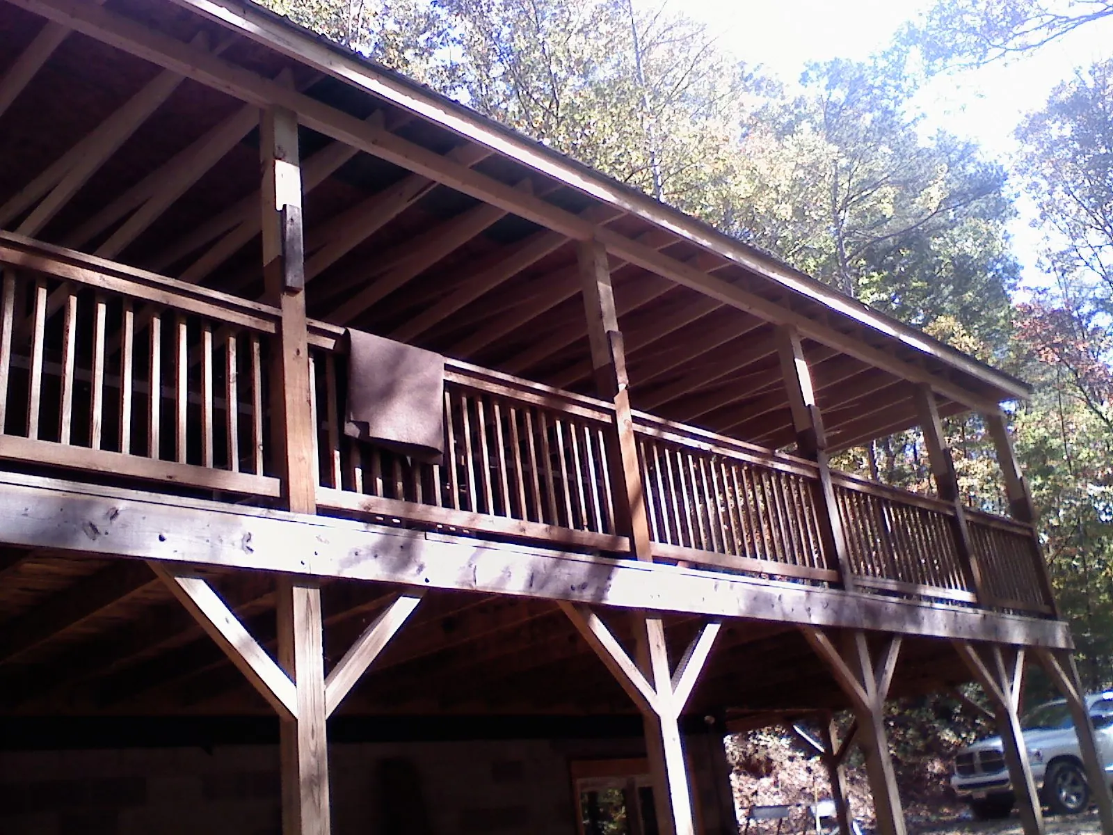 Timber framing under a new elevated porch and deck — Roof Leak Repair in Potomac by Roofing Brothers